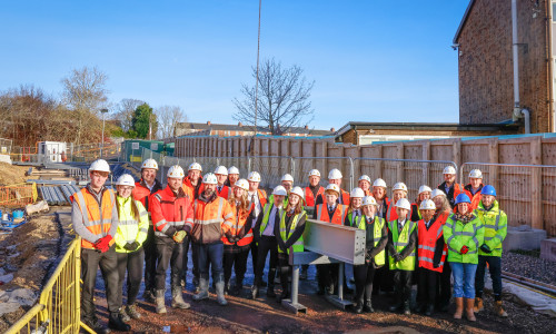 Willmott Dixon marks construction milestone at Durham Academy with steel signing ceremony