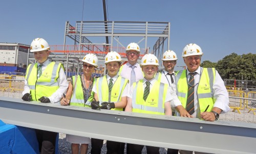 New Mosslands School celebrates milestone with steel signing ceremony 